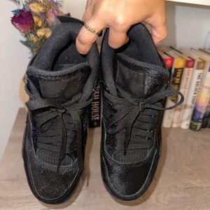 Olivia Kim Jordan 4’s
